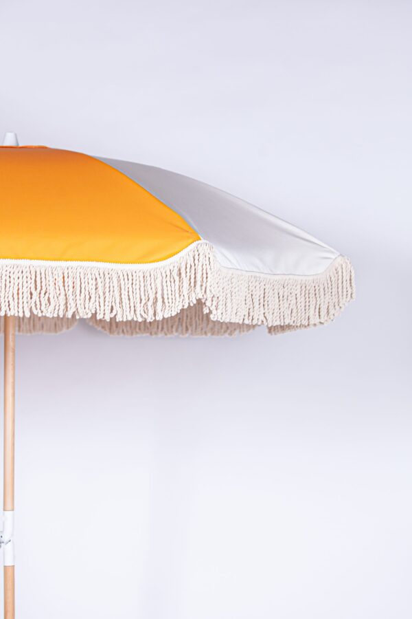 Fringed parasol-Tangerine Dream-Signature Rentals